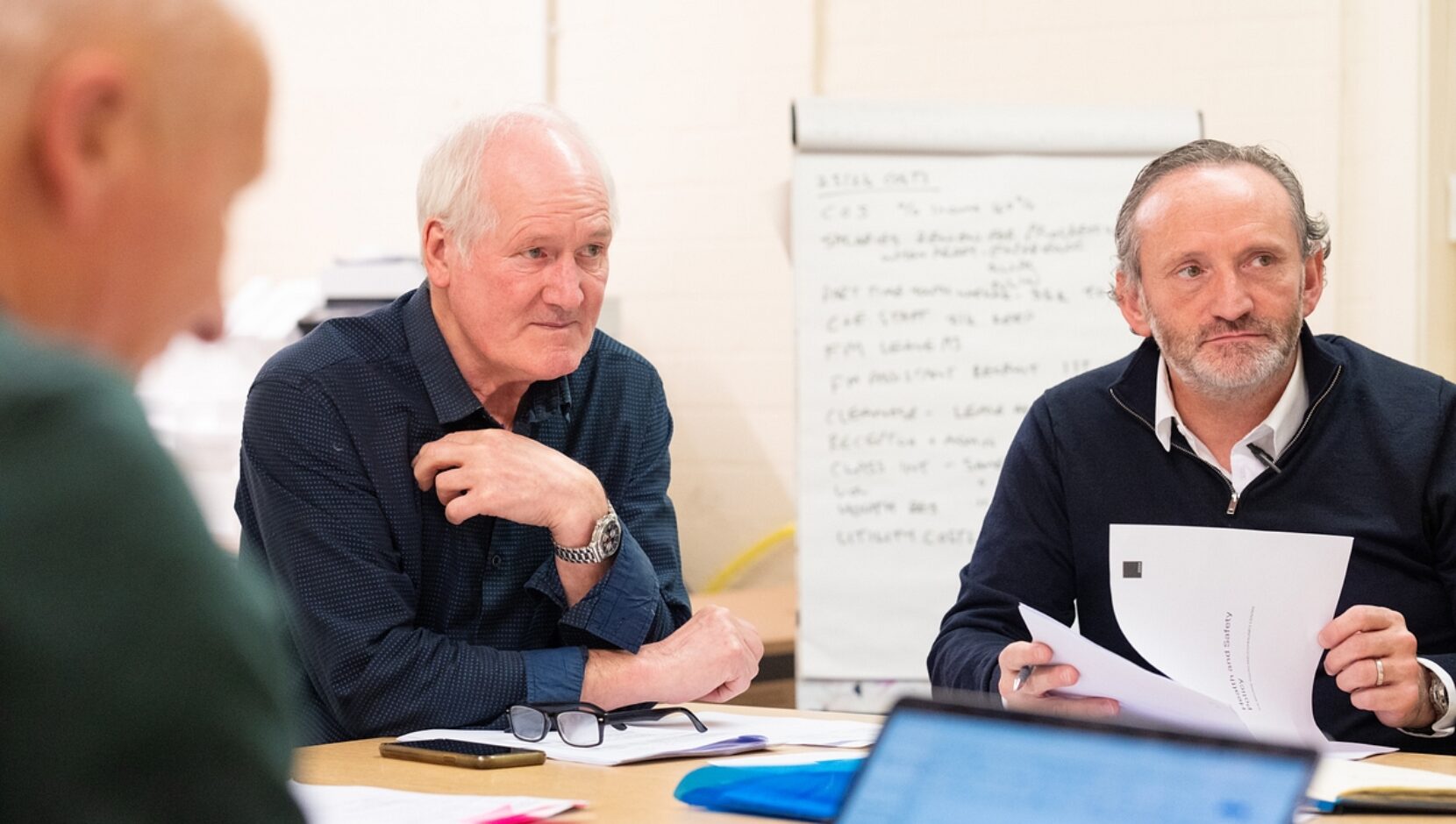 Three of The Bronte Youth and Community Centre trustees participating in a board meeting, discussing key decisions and strategies to support the future growth and development of the club