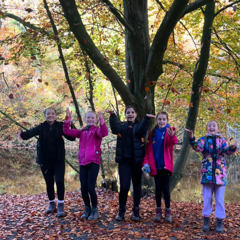 Five of our young people enjoying a walk in the scenic Yorkshire countryside during a Bronte Youth Club residential trip
