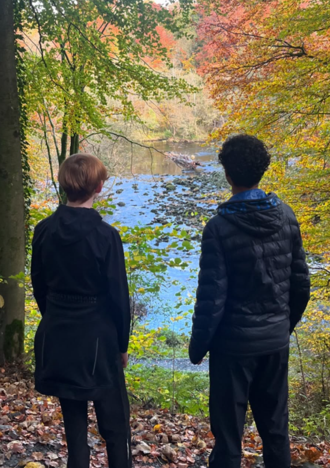 Two young people enjoying a scenic walk through the Yorkshire countryside during a Bronte Youth and Community Centre residential trip