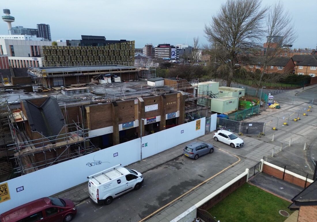 Left-side aerial drone images of the front entrance to The Bronte Youth with renovations currently undergoing outside. Located off Brownlow Hill, views of St Johns Beacon and Lime Street Station.