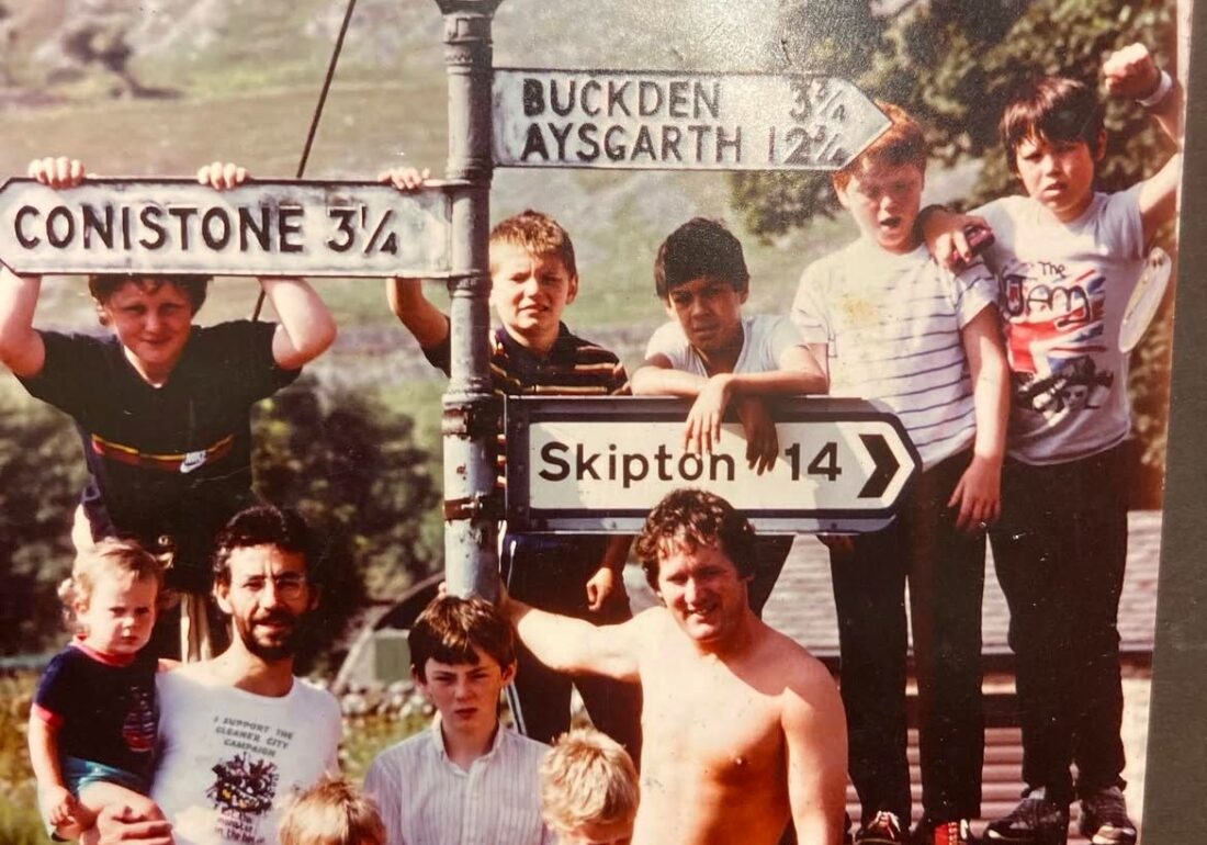 Vintage group photo of children and staff enjoying a walk during Bronte Youth Club residential to Yorkshire.